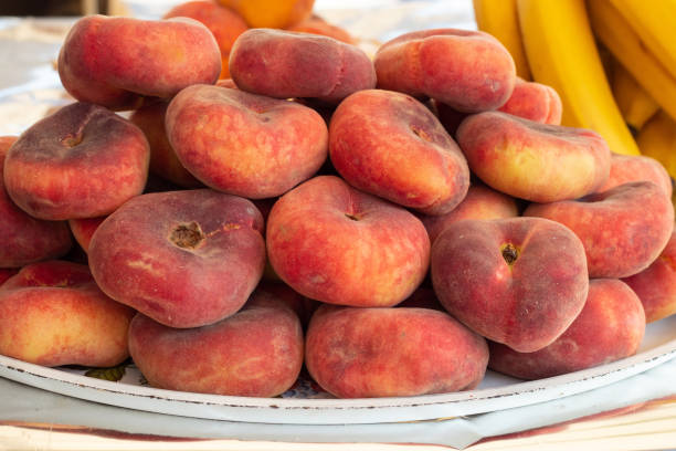 istock fig peach in a bazaar on a table in Ukraine in summer 1452292987