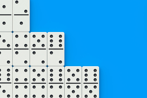 Domino tiles on blue background. Board game. Entertainment for leisure. Top view. Space for text. 3d render