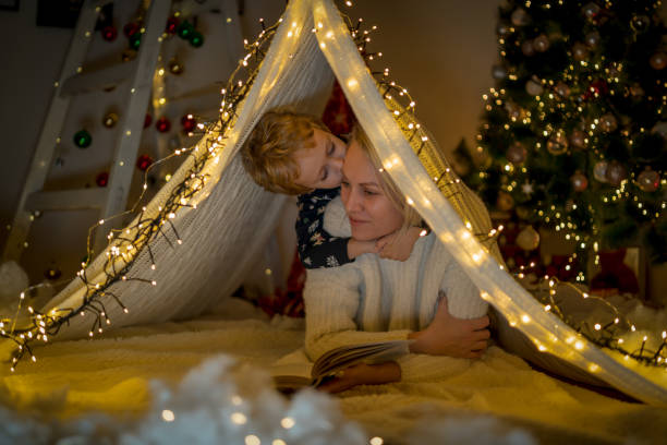 istock Love Christmas in blanket tent 1452305778