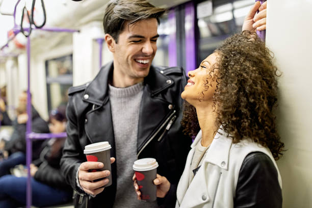 istock Happy couple talking in a subway 1452305994