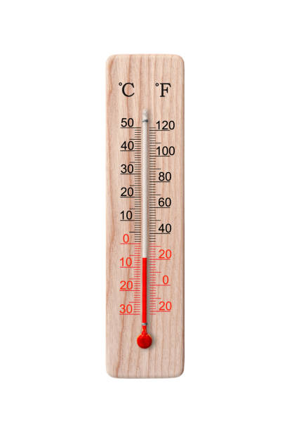 Wooden celsius and fahrenheit scale thermometer isolated on a white background. Ambient temperature 6 degrees stock photo