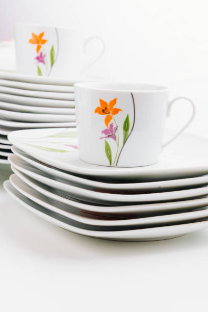 istock cups and plates with the image of flowers 1452309126