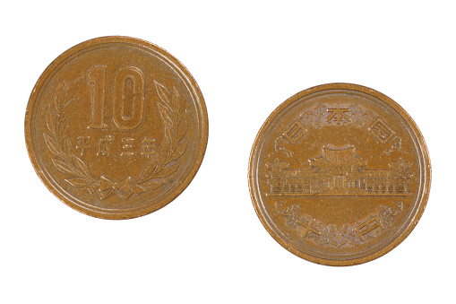 close up of a Ten Yen Japanese coin isolated on a white background