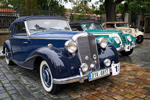 Bicester,Oxon,UK - April 23rd 2023.  1936 maroon Bentley 4¼ litre Saloon by Park Ward, one of only 12 built with this style of bodywork, travelling on an English country road