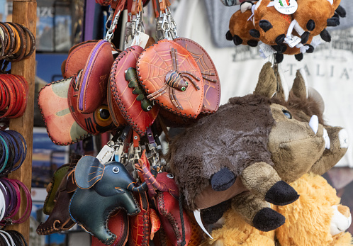 Market Stall in Florence at Tuscany, Italy with commercial symbols and logos visible.