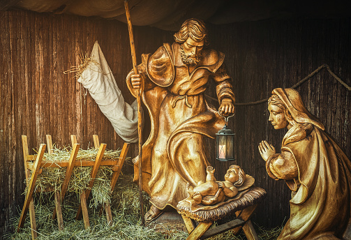 Sibiu, Romania - December 07, 2019. the scene of the birth of the Lord Jesus handmade from wood at the the Traditional Christmas market in the historic center of Sibiu, Transylvania, Romania