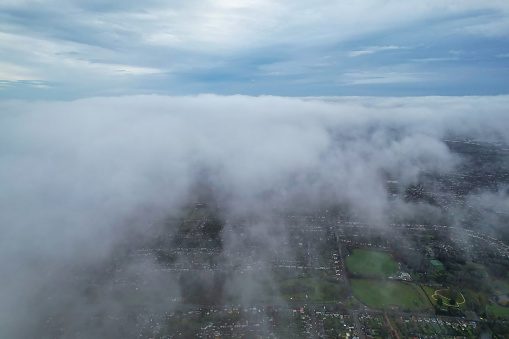Aerial and High Altitude Footage of Clouds over City, Air Plane's Window View