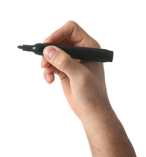 istock Man holding black marker on white background, closeup 1452319290