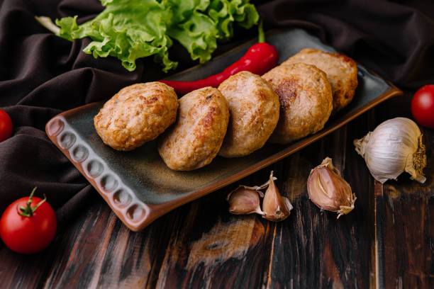 istock Delicious homemade cutlets on plate top view 1452323242