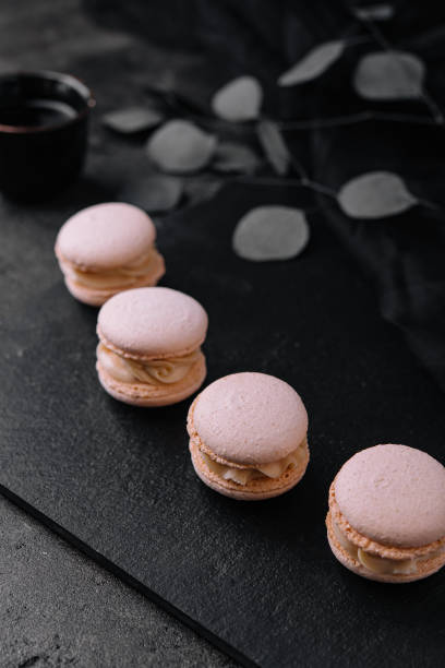 istock Delicate crumbly delightful pink macaroons close up 1452323279