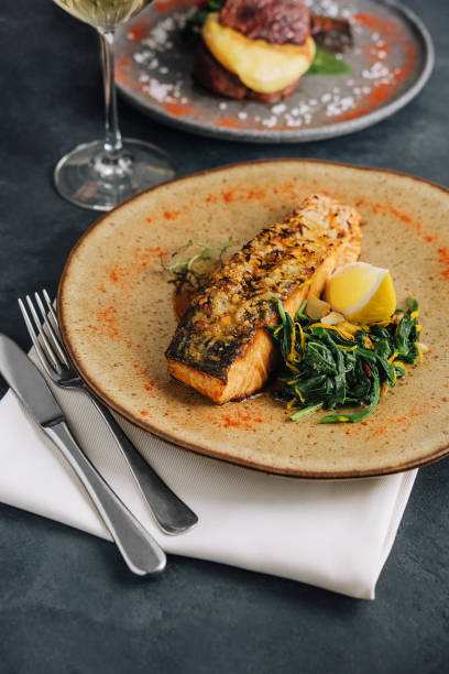 istock Roasted salmon with wakame seaweed on plate 1452323440