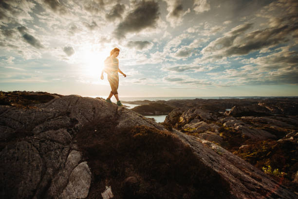 istock Woman hiking outdoors in Norway: summer adventures 1452328053