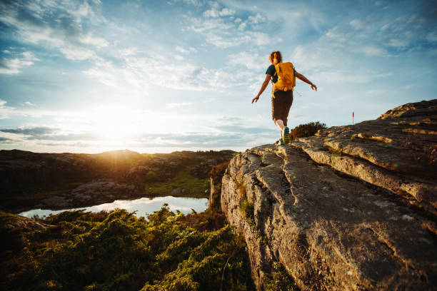 istock Woman hiking outdoors in Norway: summer adventures 1452328829