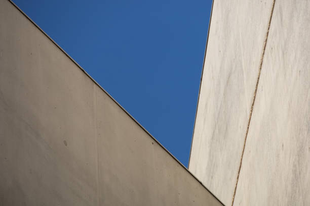 istock Modern Architecture, concrete walls with blue sky - geometric shape 1452334053