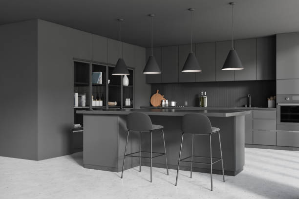 istock Grey kitchen interior with bar countertop and shelf with decor, cooking area 1452335003