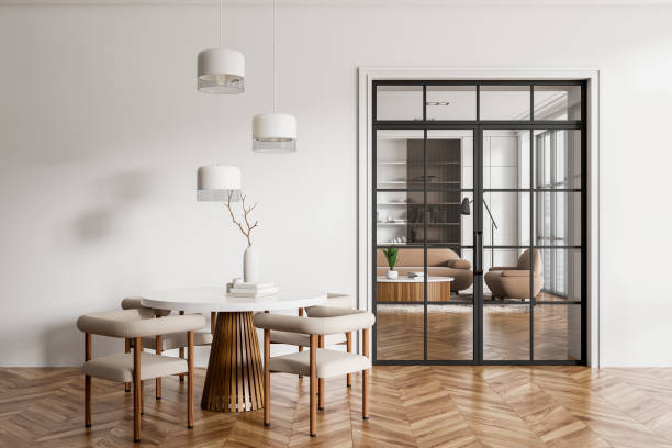 istock Bright dining and living room interior with dining table, chairs 1452335278