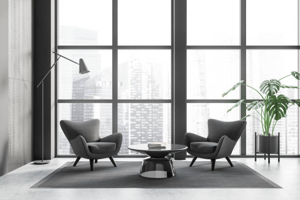 istock Grey meeting room interior with two seats and coffee table, panoramic window 1452335332