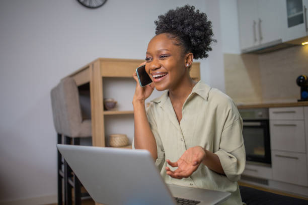 istock Young woman working from home 1452338280