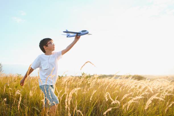 Free Stock Photo of Boy Playing With Toy Airplane | Download Free ...