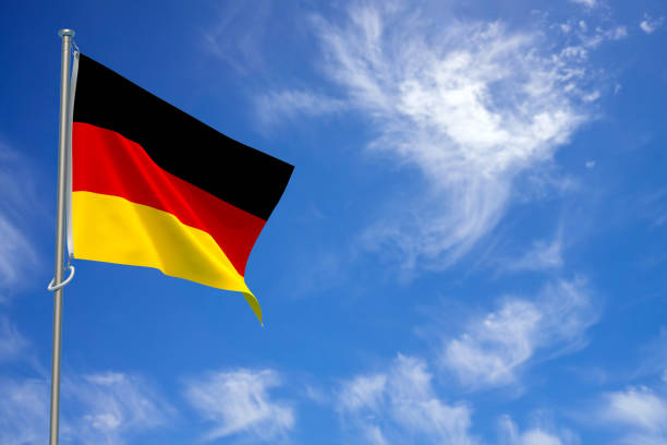 Federal Republic of Germany Flags Over Blue Sky Background. 3D Illustration stock photo