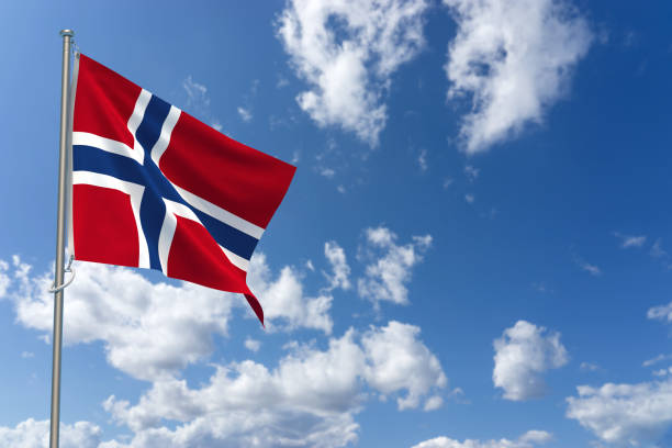 istock Kingdom of Norway Flags Over Blue Sky Background. 3D Illustration 1452342609