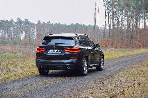 Halinin, Poland - 28th November, 2017: BMW X3 stopped on a road. The BMW is one of the most popular premium cars brand in the world.