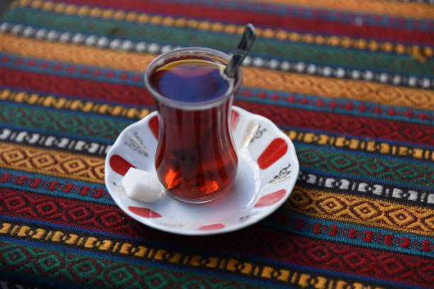 istock turkish traditional tea glass and a cup of tea 1452346363