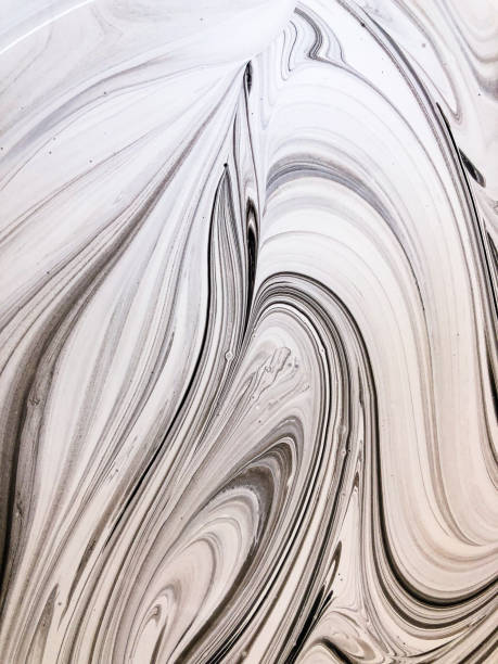 istock Black and white abstraction with liquid acrylic paint. Smooth lines and stains. 1452349445