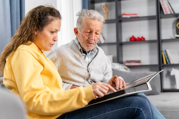istock Grandad showing his daughter memories from past 1452352420