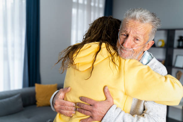 istock woman and her senior father embracing 1452352706