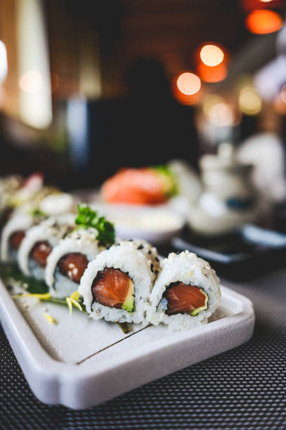 istock Sushi Salmon roll close up with selective focus. 1452353899