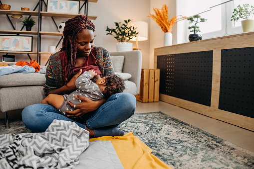 Mother breastfeeding a baby