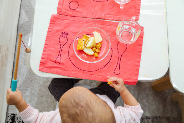 istock Top view toddler eating by the table 1452356715