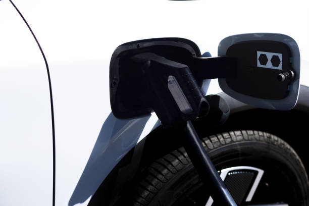 istock Car plugged at electric charger station 1452356729