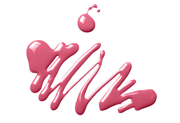 istock Sparkling magenta nail polish isolated on white background 1452358455