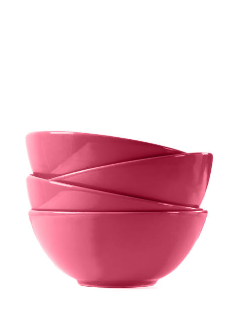 istock Stack of magenta bowls isolated on white. 1452358488