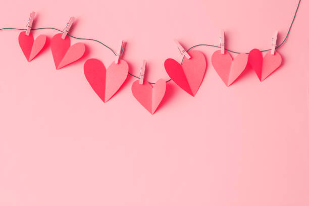 istock Paper hearts on a clothesline with space for copy 1452363199