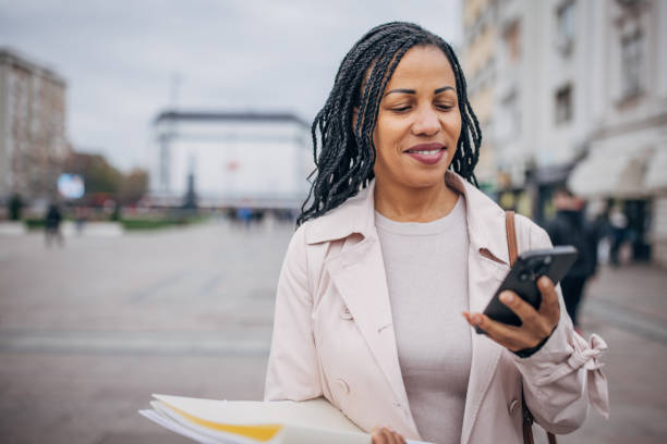 istock Businesswoman using phone 1452369939