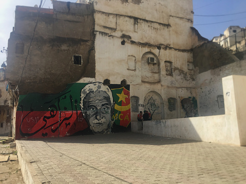 Casbah of Algiers, Algeria - October 22, 2022: Graffiti of Mouloudia Club d'Alger football club and Algerian boys.