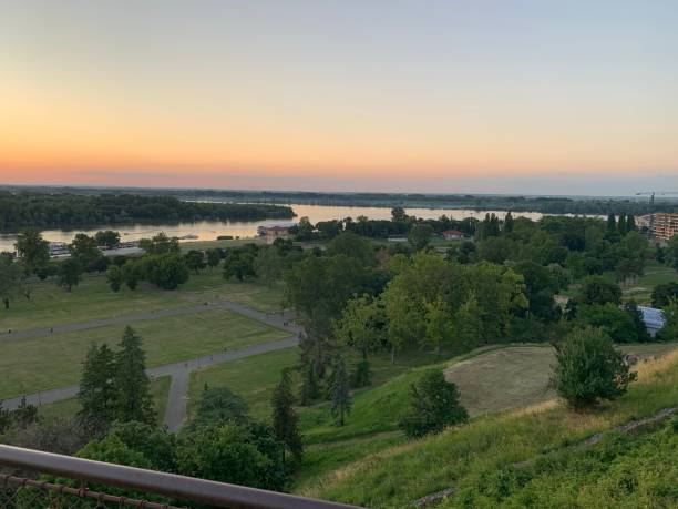 istock View from a bridge to the waterside greenery in Belgrade at sunrise 1452370243