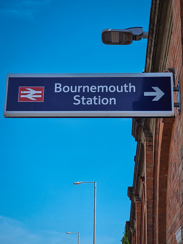 Bournemouth railway station sign , main railway station serving the famous beach-side town, popular tourist destination.