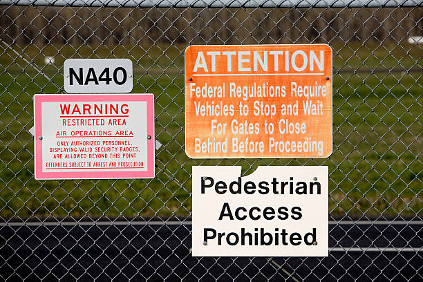 gate warning signs stock photo