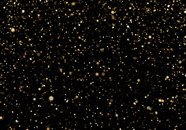 istock Falling golden glitter confetti isolated on black background. Shiny particles. Party, Merry Christmas, Happy New year, Birthday decoration. Celebration background. Soft focus. 3D rendering. 1452377120