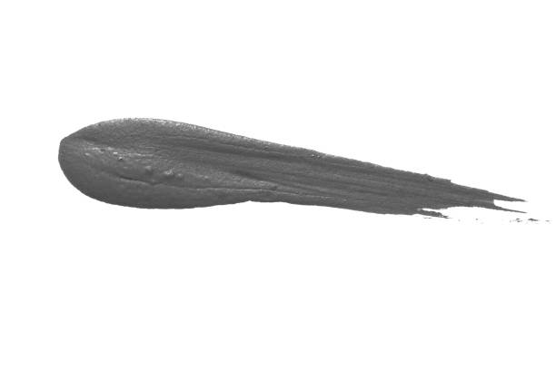 istock textured brushstroke of gray paint on white background isolated 1452377881