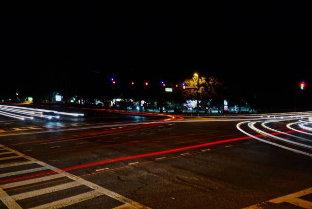 istock Light trails of cars at night 1452377923