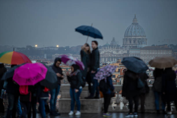 istock Rain in Rome with tourist 1452384240