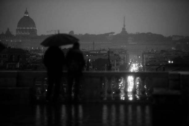 istock Dark rainy Rome with tourist 1452384285