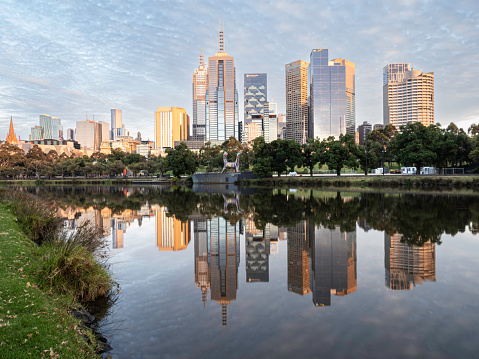 Early morning light on Melbourne skyline and reflections on the Yarra River