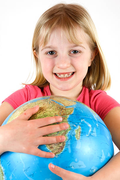 istock Young girl clutching a globe 145238744