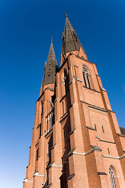 упсала собор - spire bell tower clock tower western europe стоковые фото и изображения
